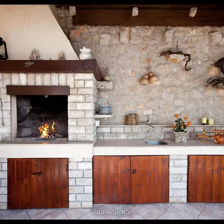 Dalmatian Seafront Villa: Private Beach, Garden & Pool Oasis